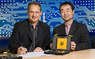 L to r: XJTAG's CEO Simon Payne with Yoshio Asano, COO of Fuji Setsubi.